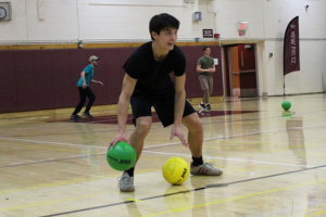   student holding a dodgeball